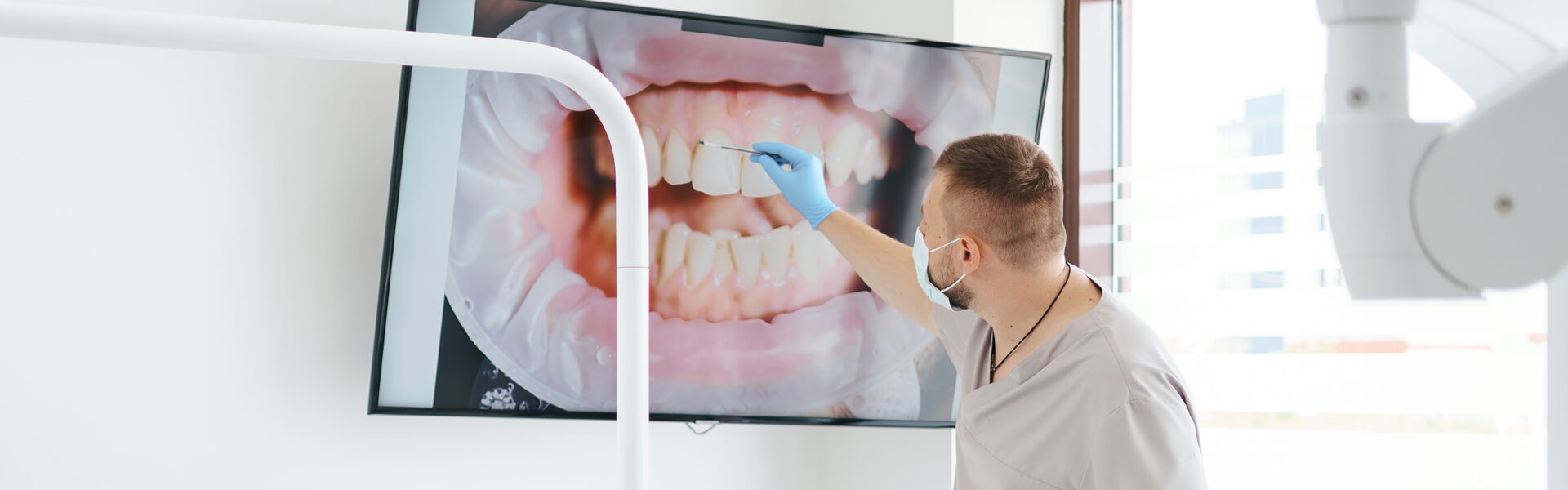 Smiling couple outdoors, showcasing bright smiles supported by modern dental care and Digital X-rays.